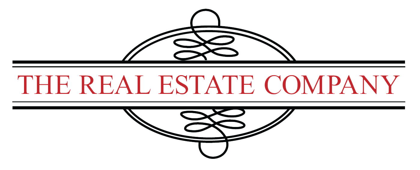 The Real Estate Company logo